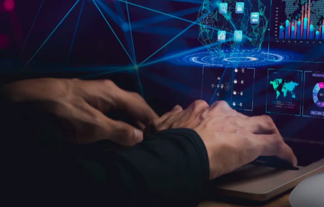 Hands at a keyboard with a data visualization overlay